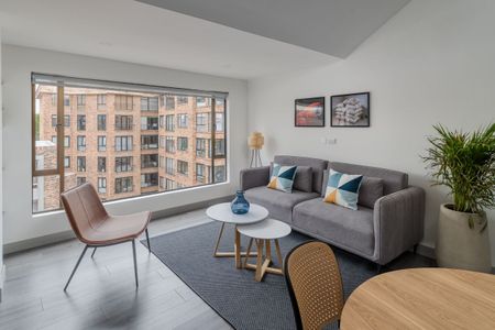 Acogedor 2BR @Corazon financiero con camas Queens